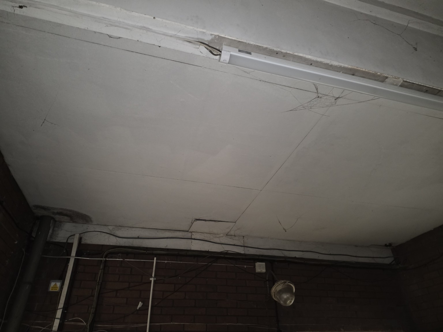 Wider view of AIB ceiling panels