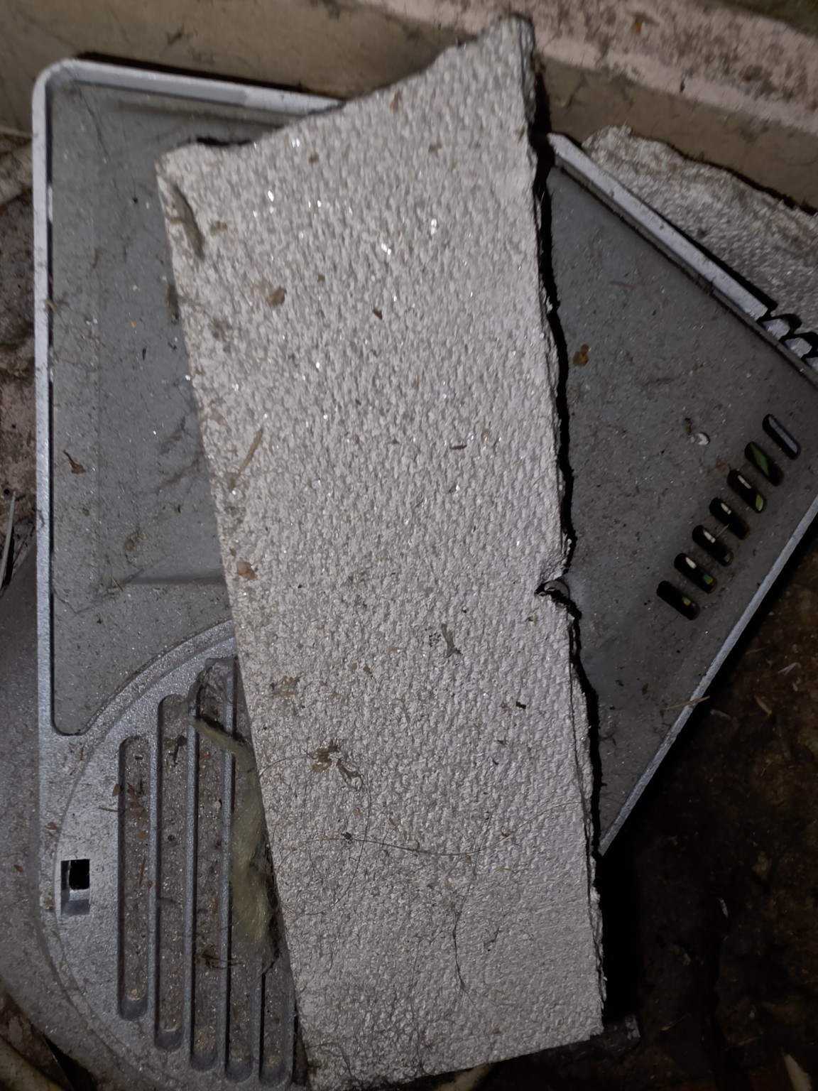 Broken Supalux non-asbestos board