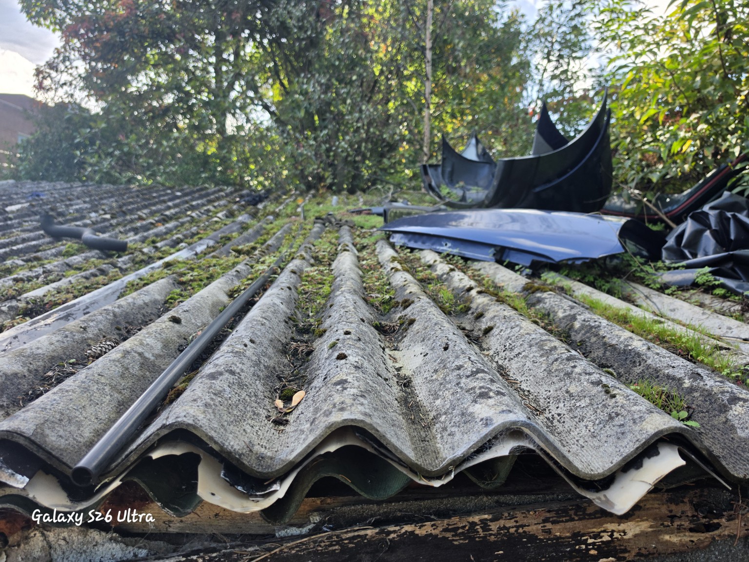 Profiled asbestos-cement roof sheets